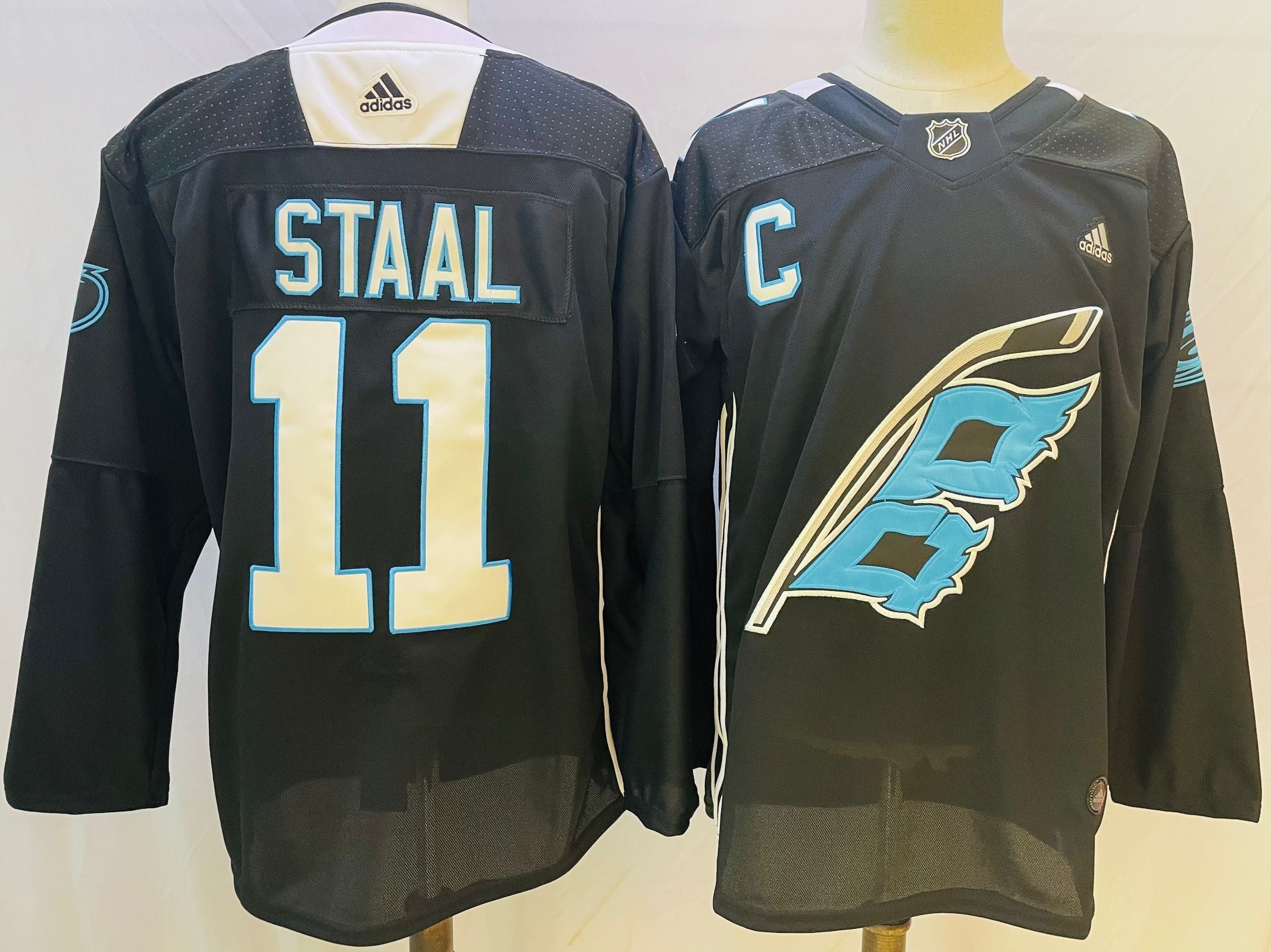 Men's Carolina Hurricanes Jordan Staal #11 Black Home Breakaway Player Jersey1